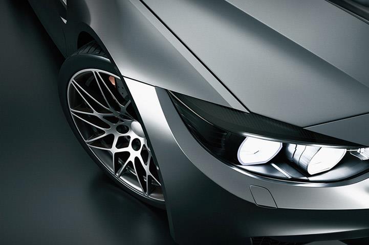 An image of a passenger front side of a luxury car.