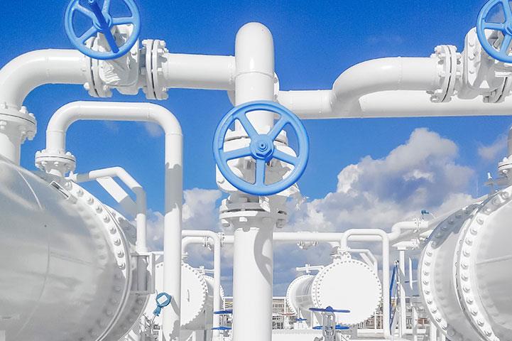 outdoor view of tanks and other equipment at a chemical processing or oil and gas facility